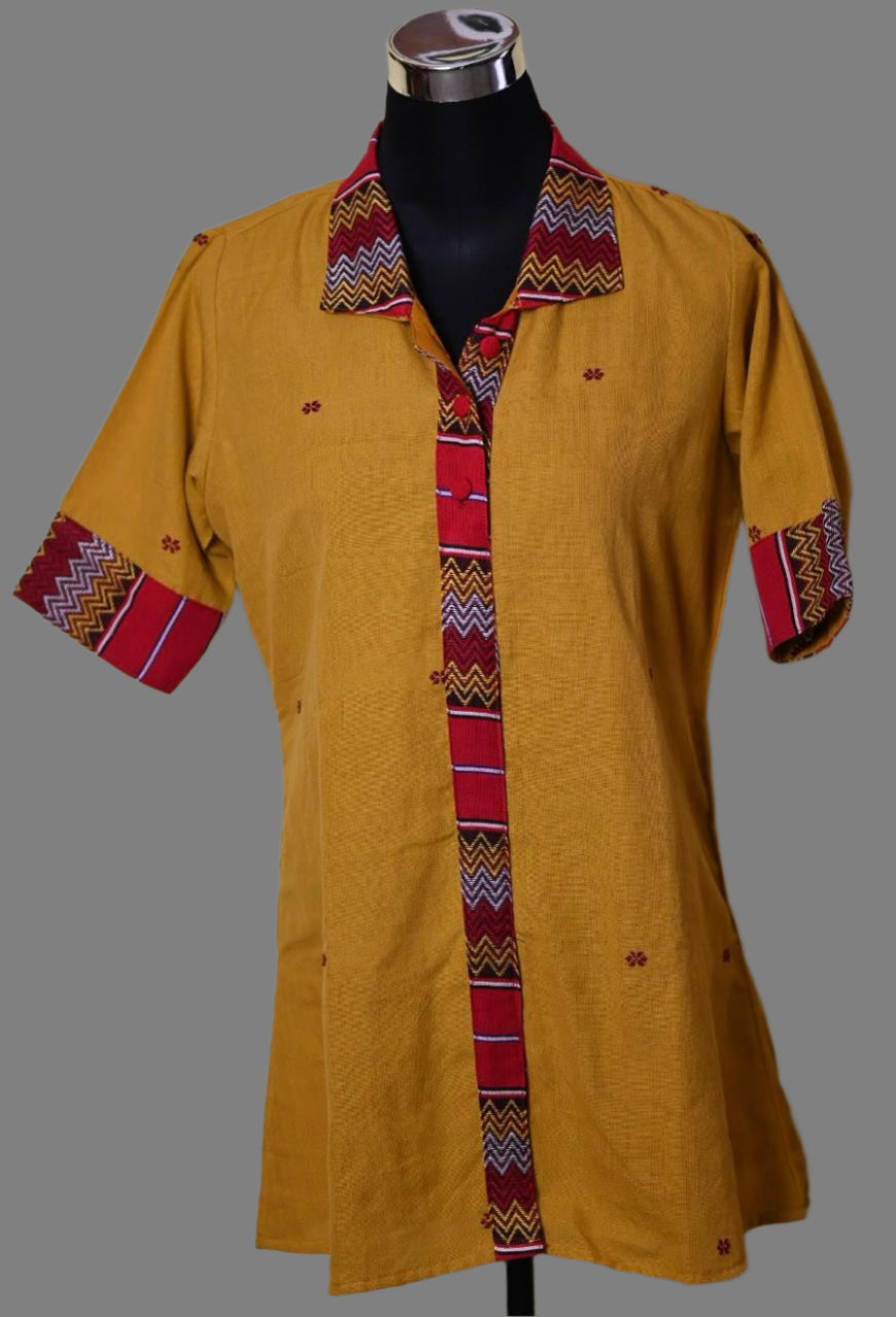 MUSTARD COTTON KURTI WITH TRADITIONAL MOTIFS OF ASSAM.